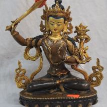 Manjushri, the Bodhisattva of Wisdom, sitting on a lotus seat (photo from heidicries.com)